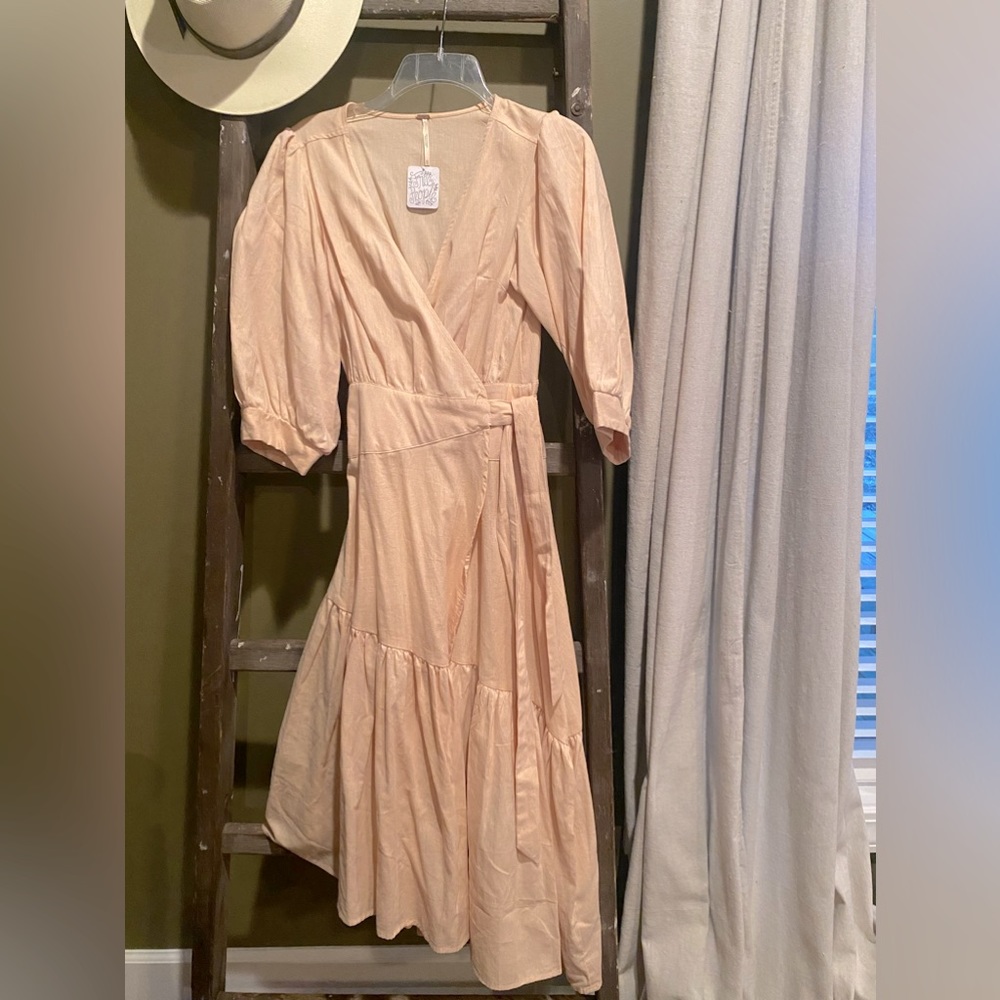 Gorgeous Free People wrap dress. NWT in size XS.